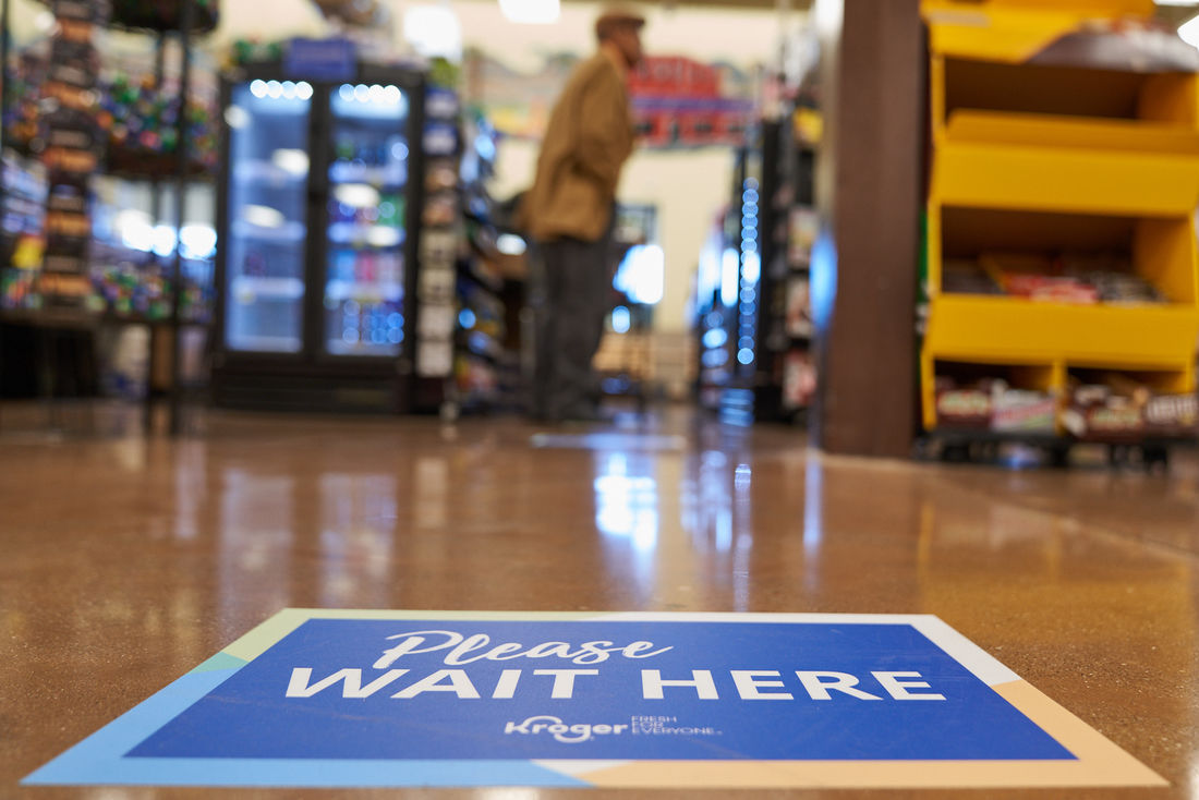 Kroger please wait here sign